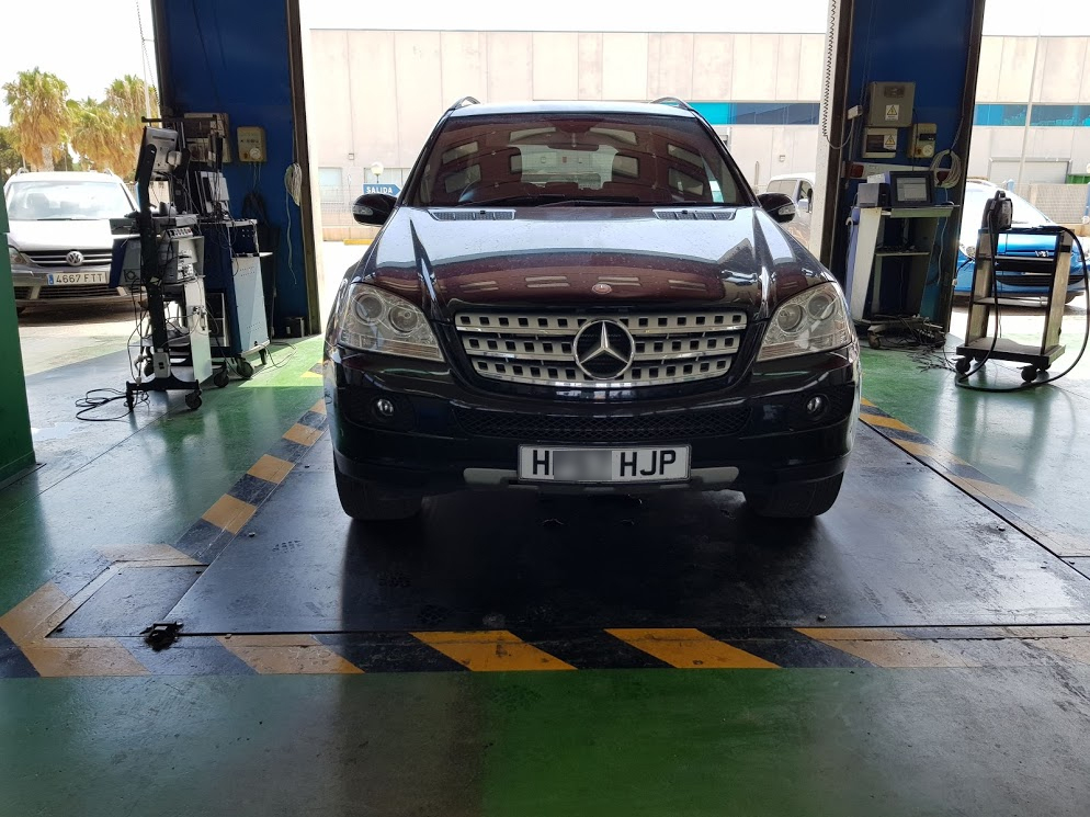 Mercedes ML-320 parked on weigh scale ready to be tested Mercedes ML import test